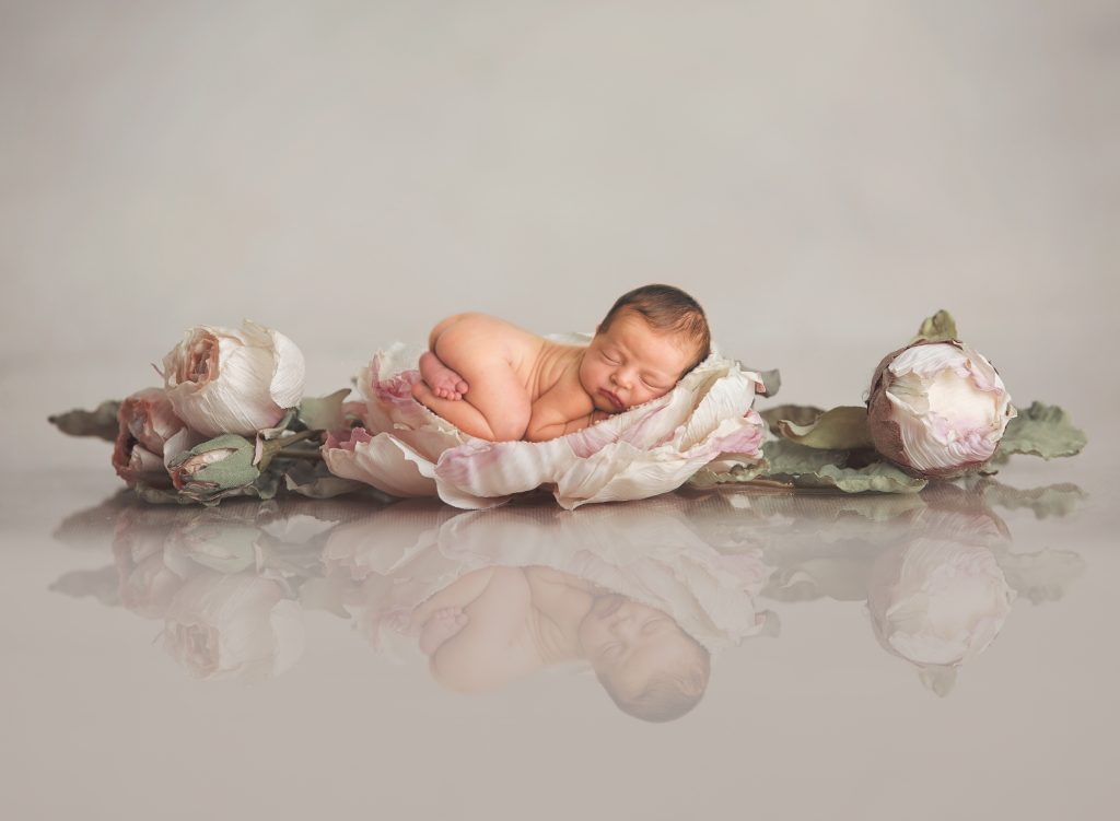 Newborn Baby Girl in a Flower
